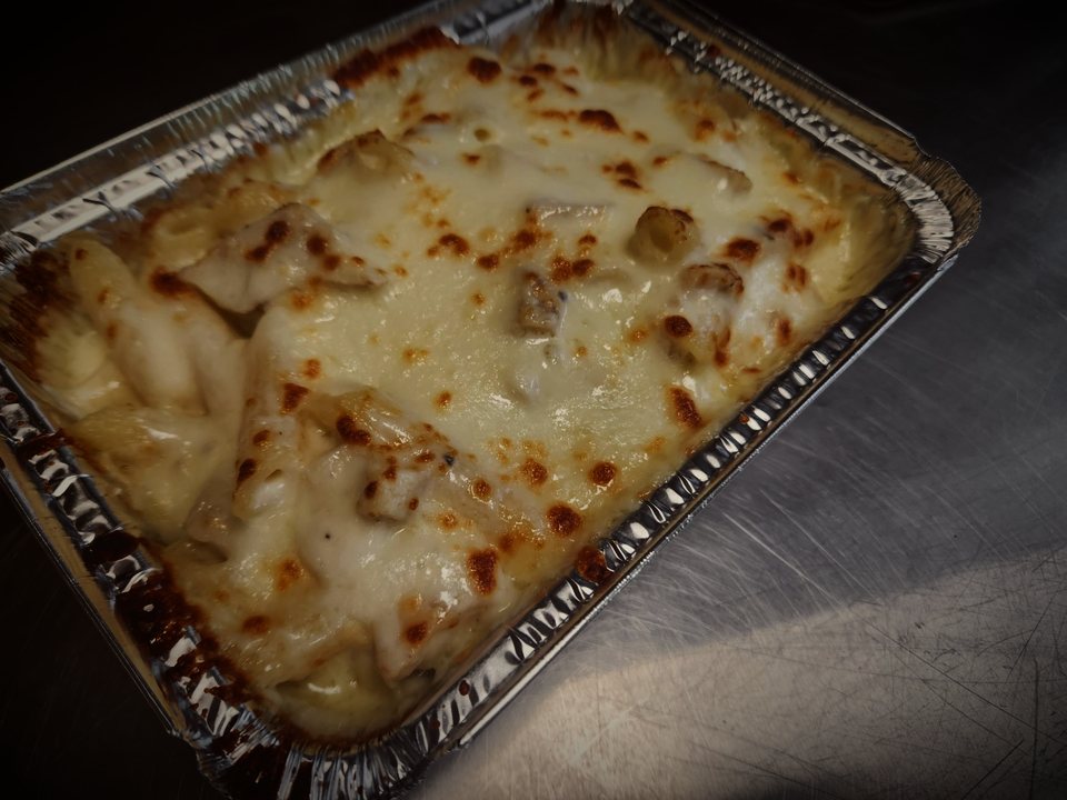 Chicken Alfredo baked pasta with golden mozzarella